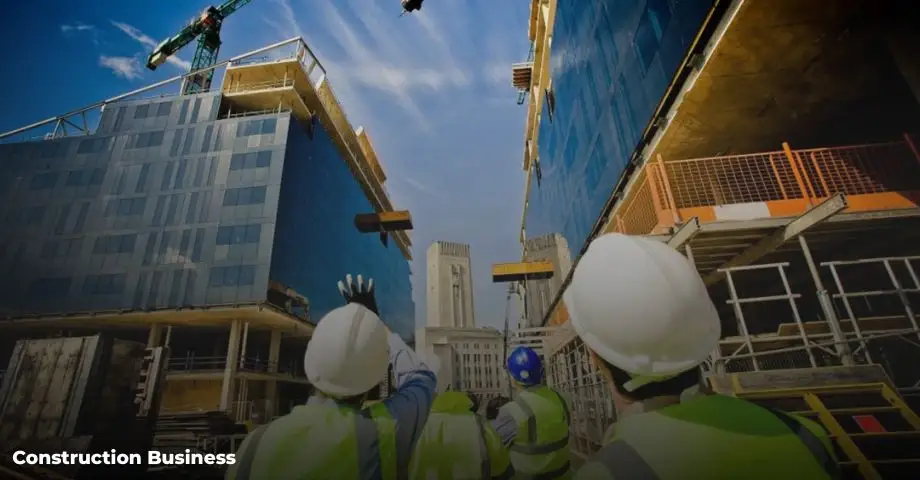 Construction workers and cranes at a building site representing a construction business