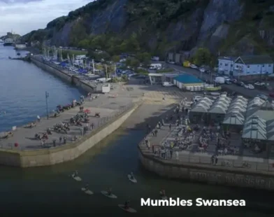 coastal view of Mumbles Swansea with pier and seaside attractions