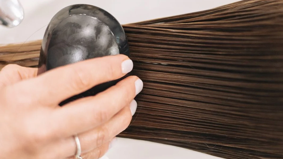brushing long smooth hair