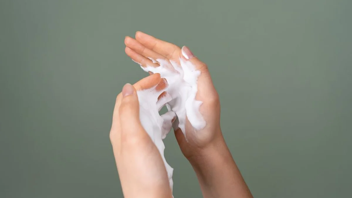 a handful of styling foam ready to apply