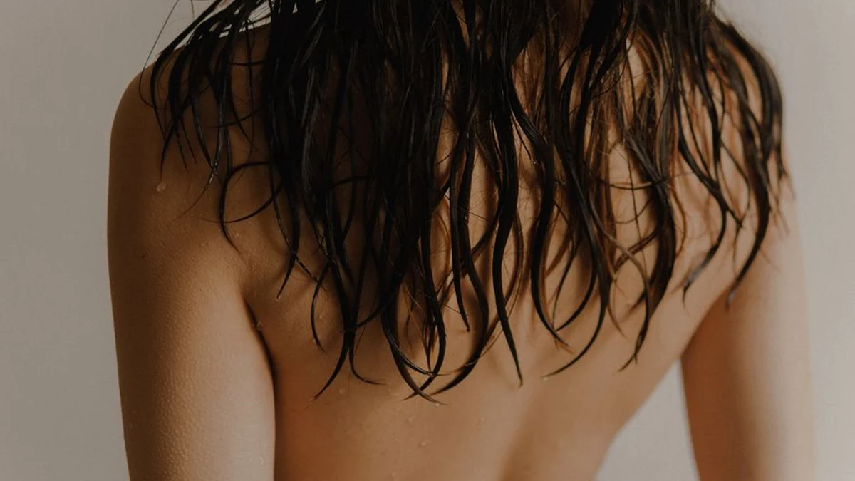 wet hair falling down the back after washing
