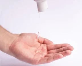 clear styling gel dispensed into an open palm