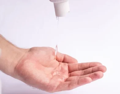 clear styling gel dispensed into an open palm