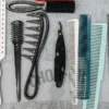 a flat lay of combs, brushes, scissors and styling tools