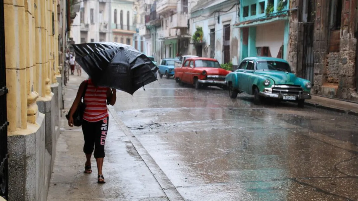 walking through a wet street on a rainy day
